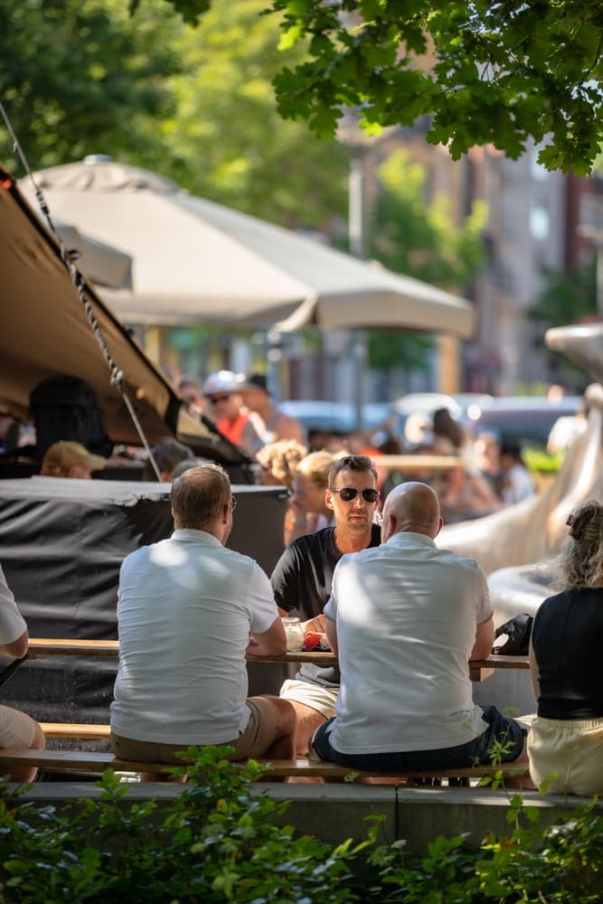 Busy beer tables under the parasols at Taphorst '26